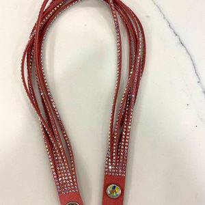 Pink leather bracelet with crystals